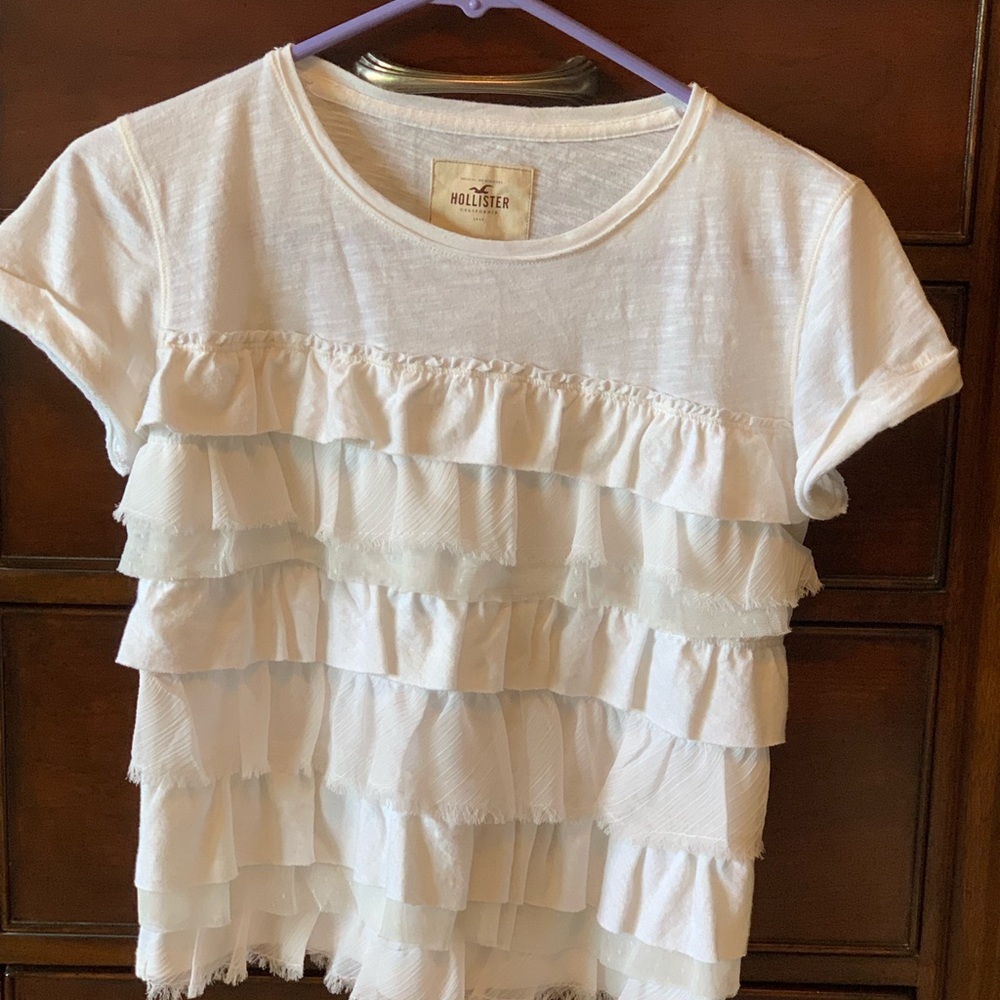 Hollister white ruffled tee shirt